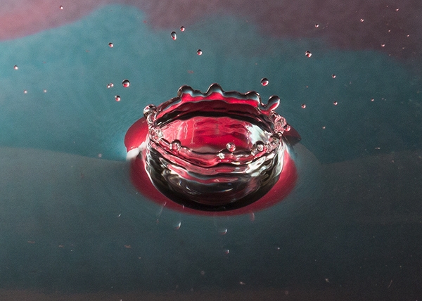 Crown Formed by Water Drop Splashing into Water